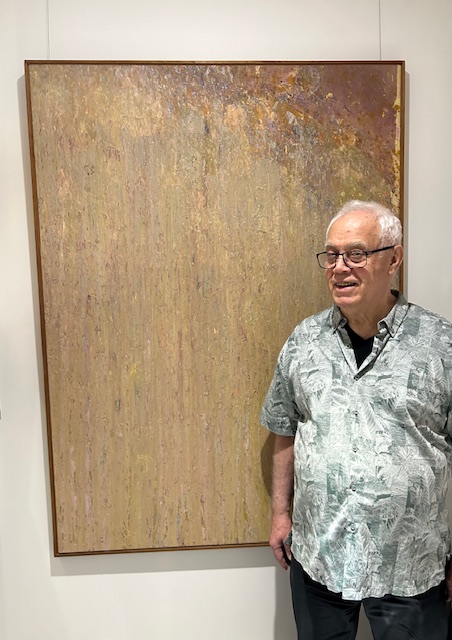 Ben Woolfitt in front of Larry Poons Untitled #2, 1972 acrylic on canvas