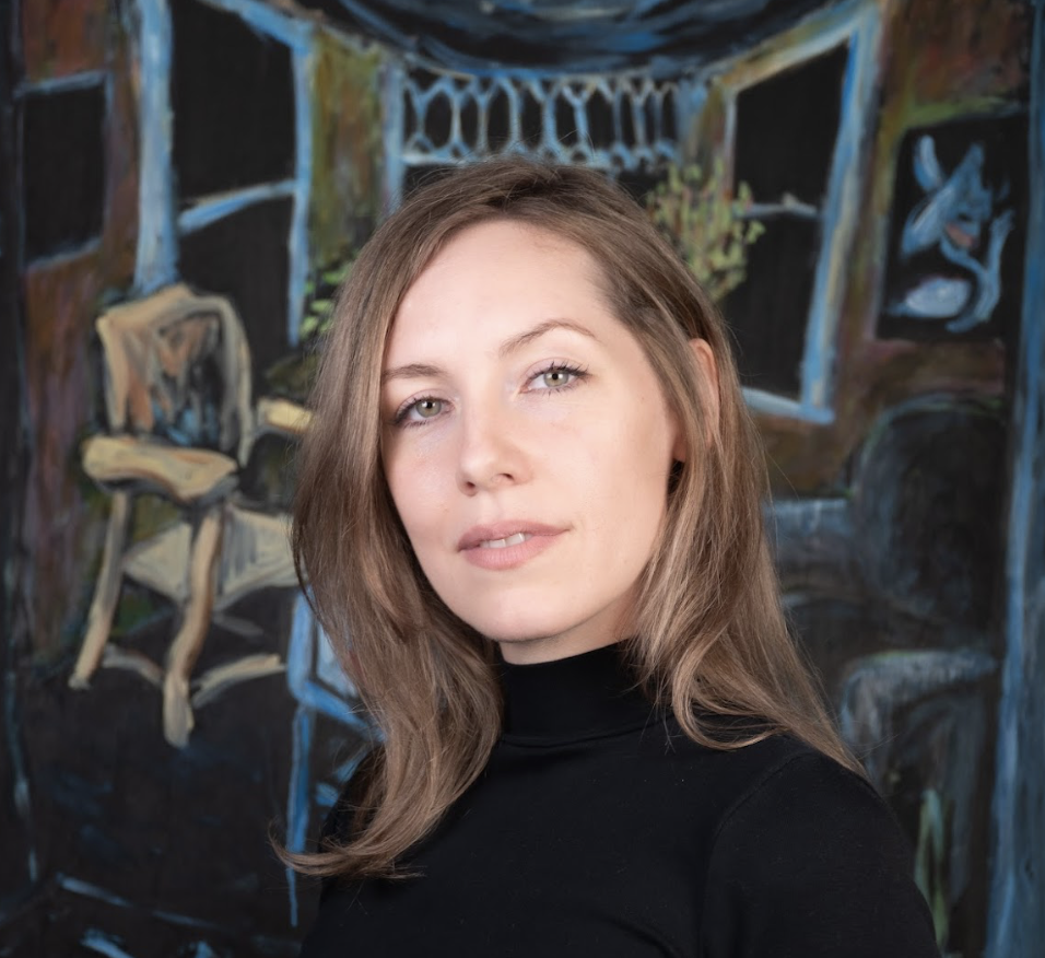 Joslyn Rogers in front of Rae Johnson's oil painting Janet's Living Room 1998, Acrylic on canvas.