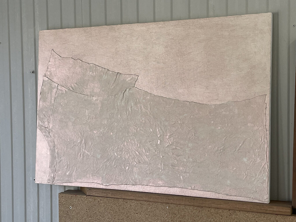Icon for Safe Passage across the Seas (2025), 45 x 67.5 cm, Abalone shell, iridescent medium, acrylic, gesso on cotton (t-shirt fragment), cheesecloth and wood board.