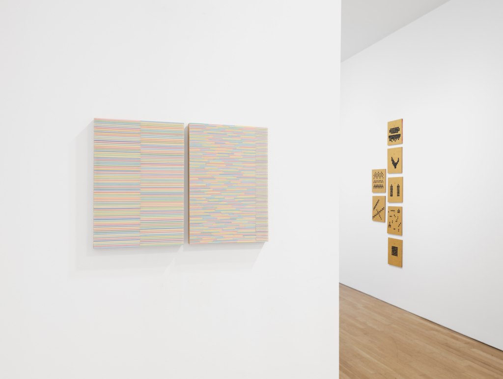 Installation view with work by Steven Salzman's  Steaws III and Straws X (left), and Andrew Huston's Days of the week (right)