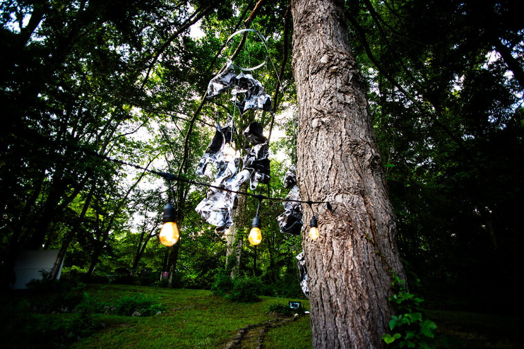 Kristin Jacobsen - “SMASH” (2026), photography mounted on aluminum mesh, dimensions variable (20 pieces sized A2 with metallic hanging. Photo Credit: Kristin Jacobsen