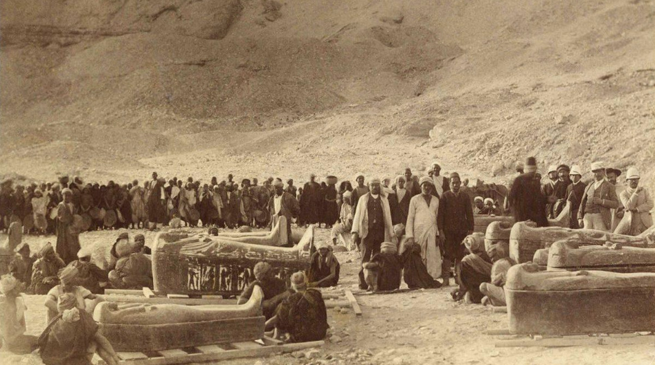 A scene suggestive of the Abd el-Rassul family discovery the royal cache years before officially revealing it in 1881, and their sale of artifacts and mummies through antiquities dealers