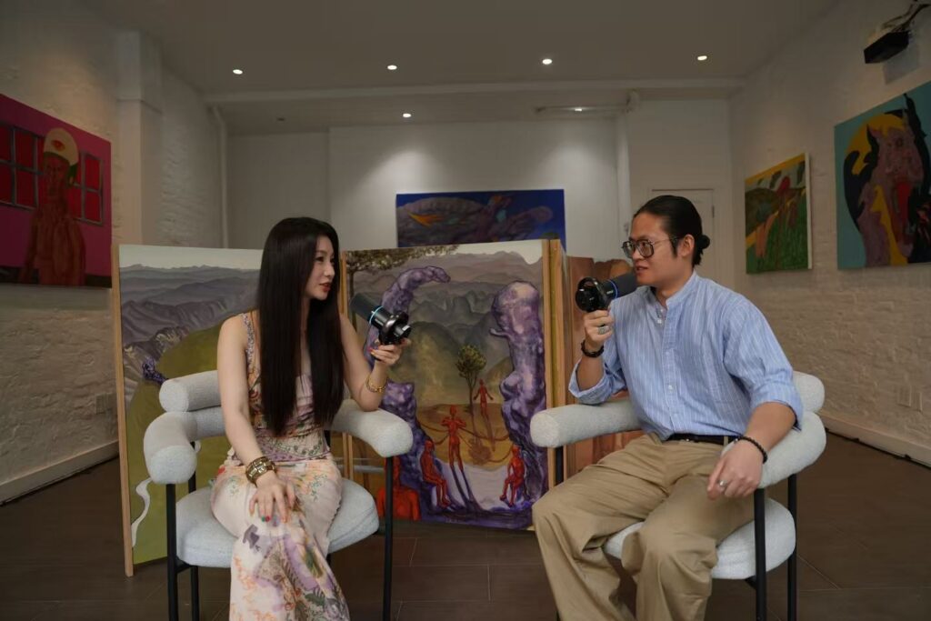 Tan interviewing Tang at Nguyen Wahed
